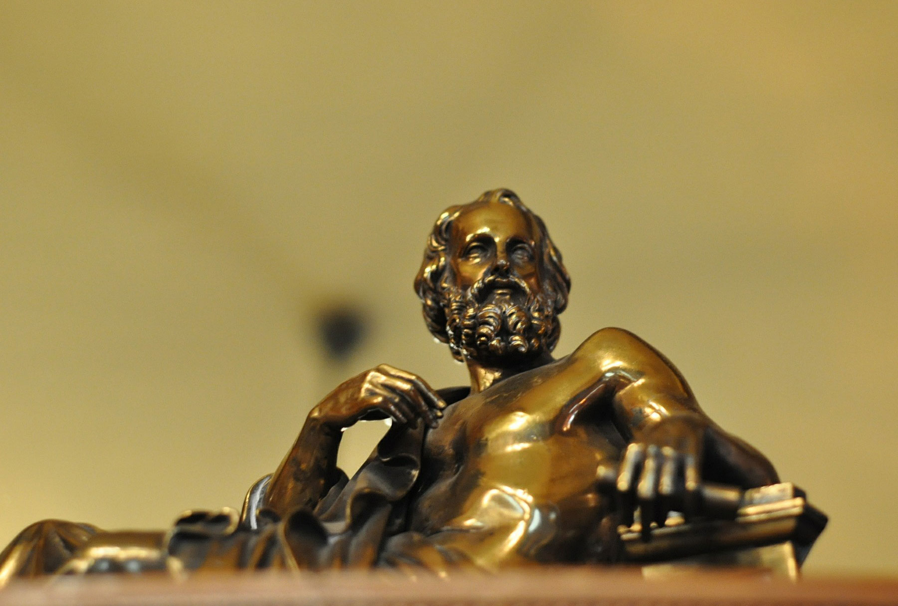 Golden statue of Greek philosopher